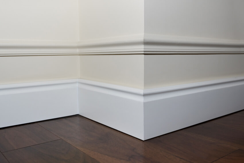 Expertly installed baseboards and trims by HandyMAX Solutions, featuring high-quality materials and precise craftsmanship for a flawless finish.